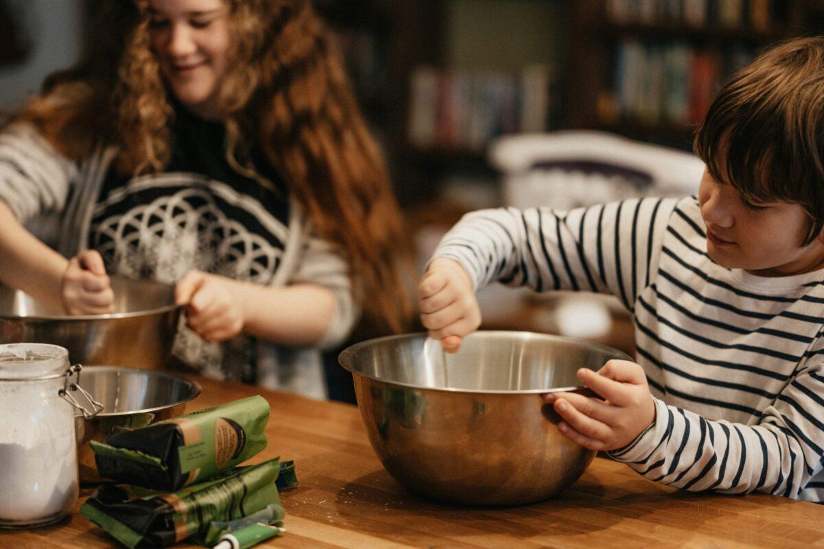 children helping cook a holiday meal